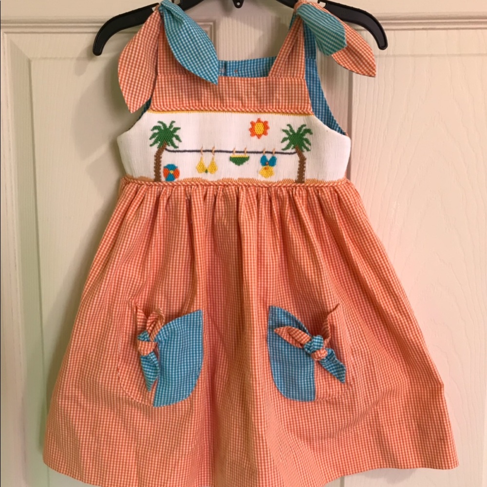 Smocked beach dress with pockets